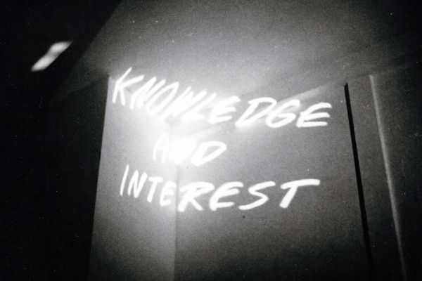 In both his first show in California and coordination with Carp, Vito Acconci installed color slides and 8mm film, and projected them to two of the upper corners of a clean, white, rectangular and darkened room.